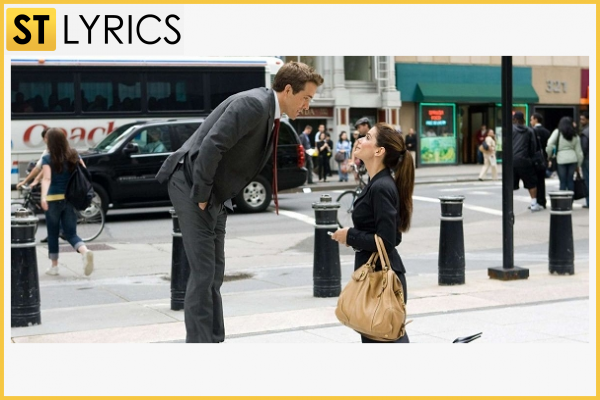 Sandra in one of her previous role. img 0 A scene from The Proposal with Ryan Reynolds. img 0
